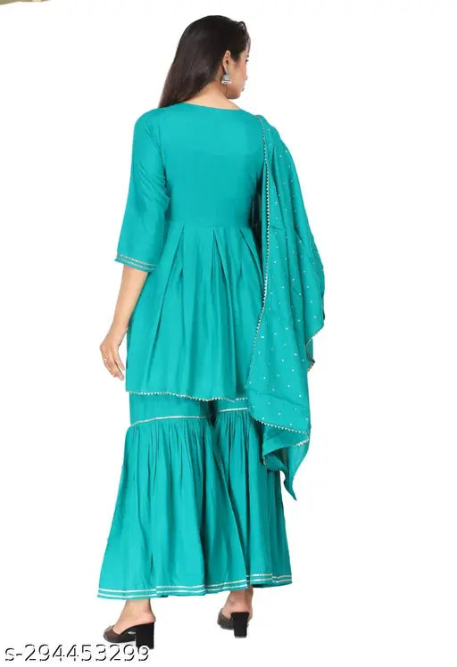 Mint green rayon kurta sharara and dupatta set with exquisite embroidery, perfect for festive occasions or casual outings