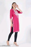 Pink embroidered wool A-line kurta for women. Cozy wool fleece, intricate Aari embroidery, calf-length with three-quarter sleeves. Winterwear for parties and casual occasions." (123 characters)