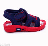 Navy blue and red children's fancy walking sandals with musical sound, featuring canvas upper and supportive rubber sole. Ideal for infants and toddlers
