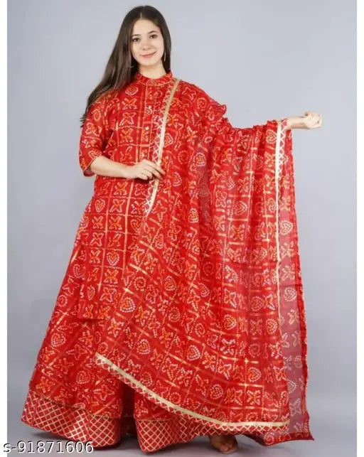 Cotton silk Rajasthani Bandhni Ghadchola Lehenga Choli set with matching dupatta and bottomwear, traditional printed Kurta featuring three-quarter sleeves, single quantity set available in sizes S, M, L, XL, XXL. Indian handcrafted lehenga with free waist (44) and length (41)