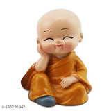 Poly resin hand-crafted Buddha figurine set, vibrant color design, decorative car accessory (4 pieces) from India
