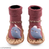 Breathable pink cotton anti-skid socks shoes for unisex kids aged 6 months to 2 years with velcro fastening and iron man pattern. Soft and comfortable for newborn babies and infants