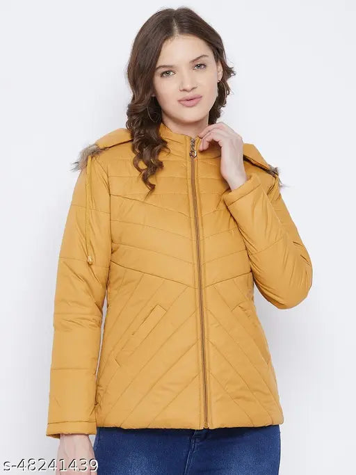 Mustard polyester women's parka jacket, quilted with polyfill and detachable faux fur hood, featuring three pockets