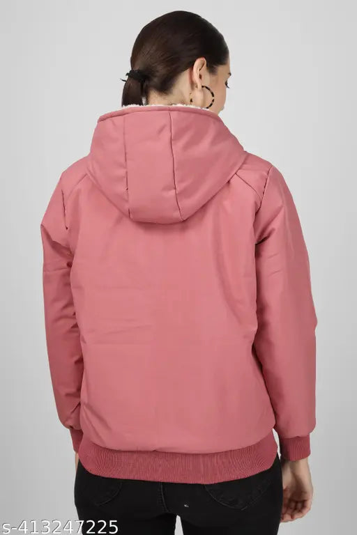 Pink nylon winter jacket for women, solid pattern with zip closure, perfect for cold weather activities and travel