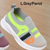 Grey polyvinyl slip-on kids shoes, fun and stylish footwear for boys and girls on display