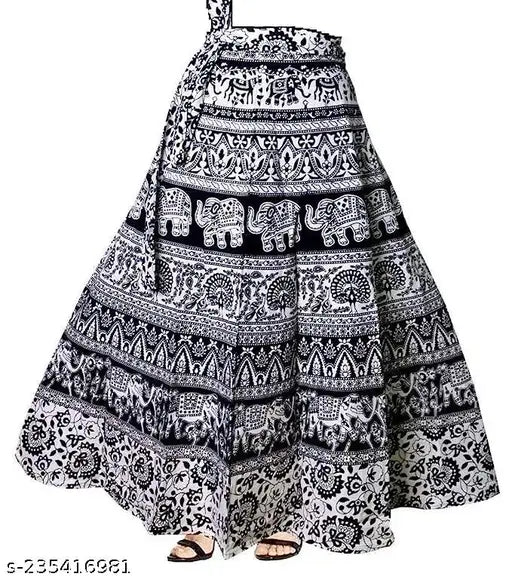 Black and white printed Rajasthani Jaipuri maxi cotton skirt with side knotting ties, adjustable fit and wrap-around style. Indian craftsmanship." (125 characters)