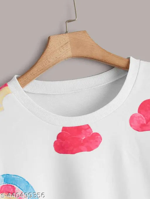 Rainbow print women's long sleeve sweatshirt, soft, breathable fabric, vibrant rainbows & fluffy clouds