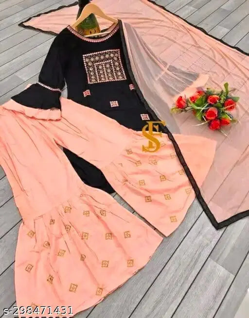 Rayon embroidered kurta set with dupatta and sharara bottomwear, featuring three-quarter sleeves. Indian ethnic women's fashion