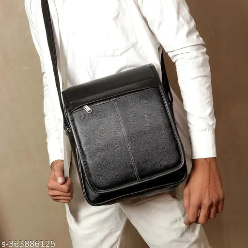 Black synthetic men's sling bag with 4 compartments, ideal for outdoor activities or travels. Adjustable shoulder strap for comfort. Solid design, strong stitching