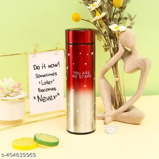 Red star printed Limited edition temperature smart stainless steel water bottle, 500ml capacity on table