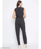 Black printed crepe sleeveless waist-tie jumpsuit with boat neck, relaxed yet flattering fit, perfect for selfies. Made in India