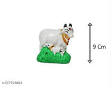 Designer stone-studded cow and calf idol in marble dust, spiritual home/temple decor item