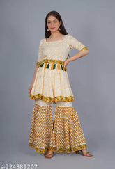Blusho rayon block print Sharara Kurta set in cream and multicolor with three-quarter sleeves and tassels, handcrafted from India