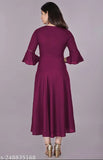 Purple rayon flared kurti with embroidery, three-quarter sleeves, suitable for casual and formal occasions. Machine washable or hand wash recommended. Size: XS (34in bust, 48in length) to XXXL (46in bust, 48in length). Made in India