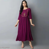 Rayon embroidered long kurta, three-quarter sleeve Indian women's fashion on mannequin