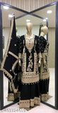 Black cotton silk Kurta with embroidered long sleeves, paired with matching plazzo and dupatta. Indian hand-embroidered traditional attire