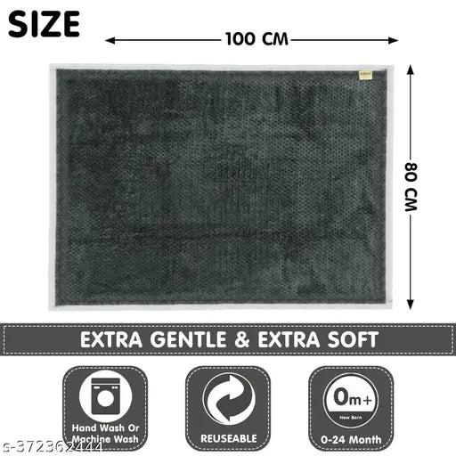 Grey fluffy fleece blend baby blanket for all seasons, ideal for both baby bays and baby girls up to 12 months. Cozy, lightweight, and reversible with machine-stitched pattern for durability. Measures 80 x 100 cm