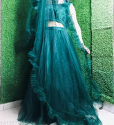 Green acrylic choli and net dupatta set, striped top with ruffled dupatta and semi-stitched lehenga for trendy party wear. Indian-made lehenga choli with sequin work and sleeves