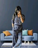 Printed polyester cord set for women, three-quarter sleeves, available in S, M, L, XL, XXL sizes. Indian-made fashion accessory on mannequin