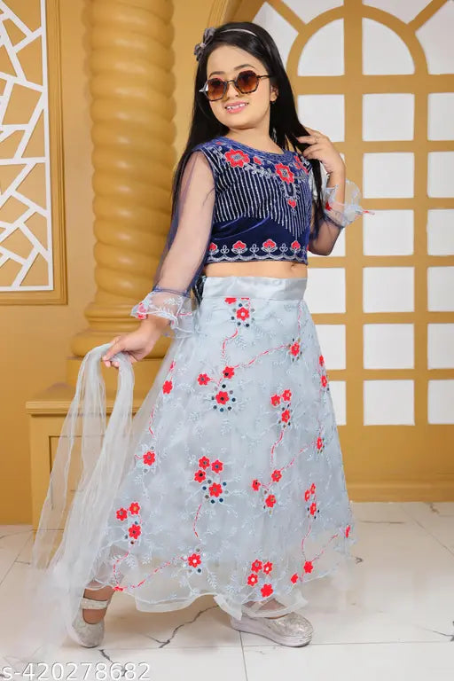 Velvet and net lehenga Choli for girls, solid pattern with zari stitch, three-quarter sleeves. Sizes range from 4-5 years to 8-9 years, originating from India