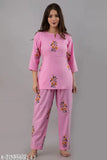 Women's cotton floral printed night suit set with three-quarter sleeves, featuring shirt and pyjamas. Indian-made ladies sleepwear with vibrant print