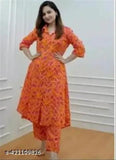 Orange rayon Anarkali A-line printed heavy kurta set with pants for women, perfect for upcoming functions and events