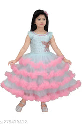 Pink net frock gown dress for girls, semi-transparent net fabric, vibrant pink color, embellished with sequins or beads, sleeveless design, perfect for special occasions, origin India