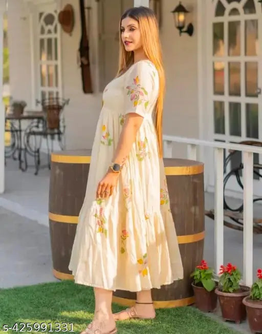 Pink floral print rayon kurta for women, short sleeves, versatile styles & necklines