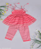 Pink pure cotton printed kurti pajama set for kids girls, featuring churidar bottoms and sleeveless tops. Available sizes range from 12-18 months to 5-6 years. Indian origin