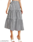 Black and white plaid women's cotton-linen high waist midi skirt with elastic waist and tiered pleats, perfect for summer casual outfits