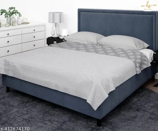 Grey Leaves Reversible Cotton Blanket for Double Bed, ideal for all seasons and year-round use. Floral pattern with 200 thread count. Measures 86" x 94.5". Hand and machine washable, made in India