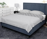 Grey Leaves Reversible Cotton Blanket for Double Bed, ideal for all seasons and year-round use. Floral pattern with 200 thread count. Measures 86" x 94.5". Hand and machine washable, made in India