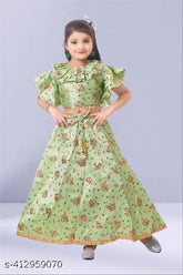 Printed art silk lehenga choli set for girls, applique net pattern on display