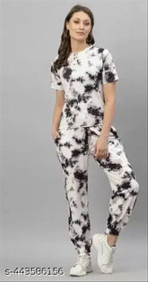 Poly crepe night suit and dress set, soft, ambient lighting, modern decor, blackout curtains, en-suite spa bath, India