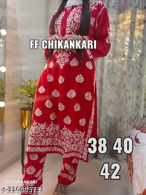 Elegant red chickenwork kurta with plazzo, rayon material for women's ethnic fashion. Indian designer traditional kurti set with embroidered net print and matching pants in multiple sizes: L, XXL, XXXL, 4XL, 5XL, 6XL. Country of origin: India