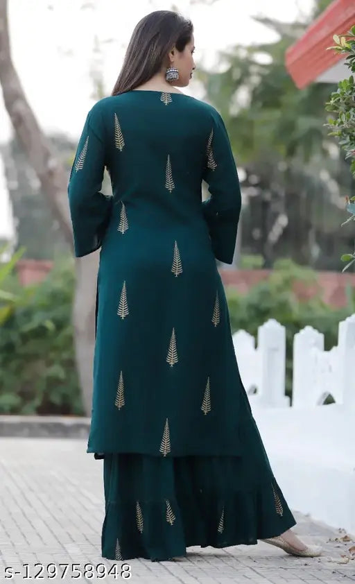 Green rayon printed kurta with sharara, Indian premium three-quarter sleeves bottomwear on display stand