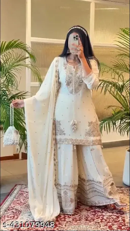 Trendy silk kurta set with embroidered dupatta and gharara, intricate floral patterns, scalloped edges, ready-to-wear Indian party wear