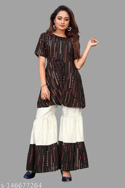 Rayon Indian ethnic tunic top kurta set with sharara bottom, printed net pattern on display