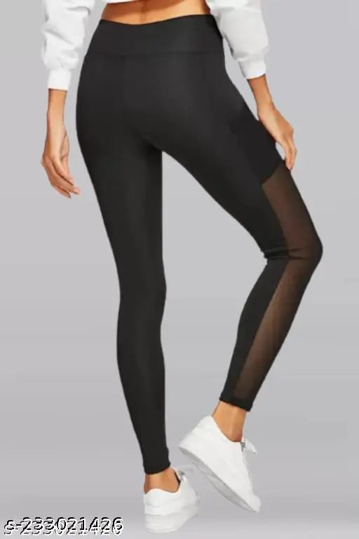 Green-shade striped net Lycra track pant for women, ideal for gym & track wear, classic fit on display