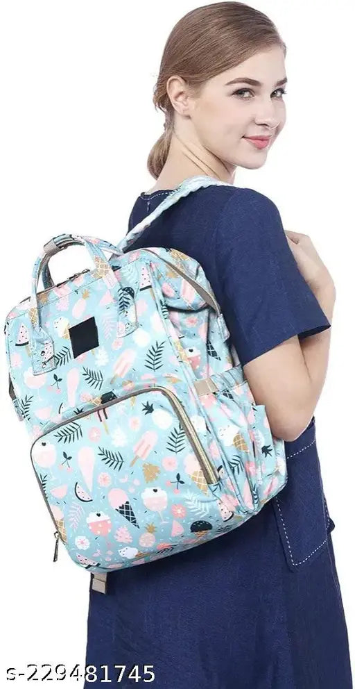 Light green unicon print diaper backpack, waterproof premium bag for mothers with 13 pockets and insulated milk bottle holders. Perfect for organizing baby essentials during travel