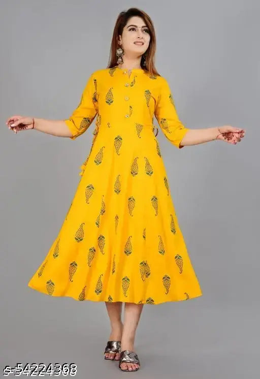 Yellow rayon women's printed Aline kurti with three-quarter sleeves, great for casualwear. Made in India