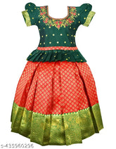 Blue & Pink Traditional Indian Lehenga Choli Set: Royal blue blouse with floral embroidery, short puffed sleeves; Vibrant pink skirt with golden zari work. Perfect for weddings, festivals, or special occasions