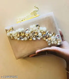 Golden resin, heavily studded Indian handicraft clutch for women's party look. One compartment, free size (7x4 inches), embellished with embroidered net