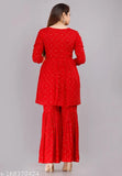 Red printed rayon Kurta and Sharara set with three-quarter sleeves, embellished with gold print work, Indian fashion wear for women