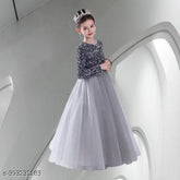 Designer net kids gown, three-quarter sleeves, solid pattern. Elegant holiday toddler party dress from B.R. Enterprise, size 5-16 years
