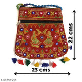 Red, blue, and yellow beadwork; traditional Indian design; large decorative purse with tassels