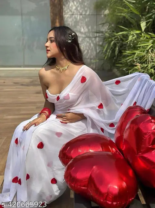Trending georgette heart shape embroidered saree with matching running blouse, free size from India