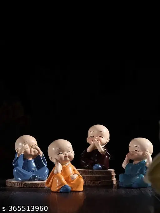 Multicolor handcrafted baby monk Buddha statues set of 4 decorative showpieces, 12cm polyresin figurines for auto showcase