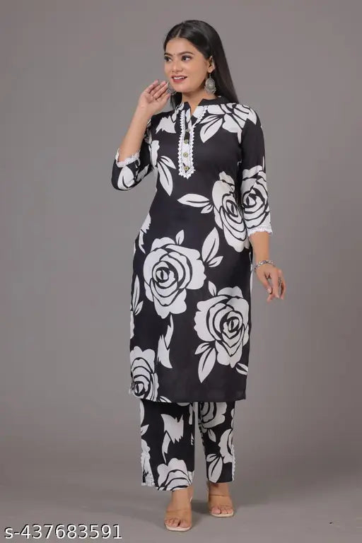 Black rayon kurta pant set, printed design by Neel Fashion & Art Gallery, three-quarter sleeves, palazzos style