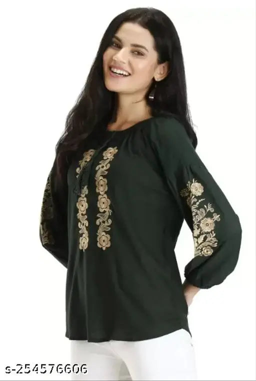 Green and orange embroidered viscose rayon flared tunic with three-quarter sleeves and border embroidery on sleeves for women's rib crop top